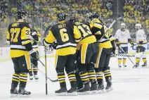  ?? KIRK IRWIN/GETTY IMAGES FILES ?? Nick Bonino, who had to be helped off the ice by his Pittsburgh Penguins teammates after blocking a shot early in Game 2 of the Stanley Cup final on May 31, practised on Sunday.