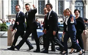  ??  ?? Luigi Di Maio, leader of the Five-Star movement and Italy’s new Labour and Industry Minister with party colleagues at the Quirinal palace in Rome, Italy. Photo: Alessandro Bianchi/Reuters