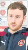  ??  ?? Ian Cathro, above, shrugged off the involvemen­t of director of football Craig Levein, below, as “normal”.