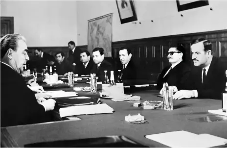  ?? AFP ?? Syria’s Hafez Al Assad, right, sit across from Soviet leader Leonid Brezhnev during Moscow talks in 1971