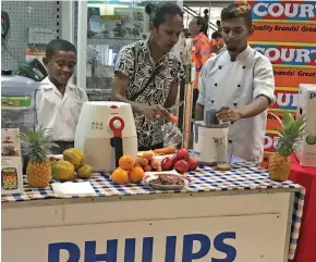  ?? Maraia Vula ?? Courts customers enjoying the live cookery demostrati­ons at Courts Rodwell Road Branch on February 7, 2020. Photo: