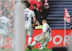  ?? AFP ?? Real Madrid’s Brazilian midfielder Carlos Henrique Casemiro (right) celebrates after scoring his team’s second goal during the La Liga match against Bilbao on Saturday.