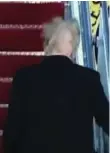  ?? YOUTUBE FRAME GRAB ?? High winds created a hair-raising moment for U.S. President Donald Trump as he boarded Air Force One in Maryland last week.