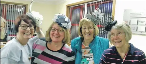  ??  ?? Lamlash SWI members modelling hats are, left to right: Jean McInnes, Kirsty Forsyth, Kath Turner and Vivienne Haigh.