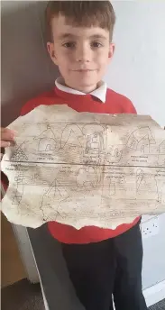  ??  ?? ● A pupil with one of the timelines created during the Archaeolog­y Club