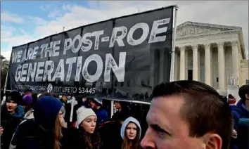  ?? Michael S. Williamson/Associated Press ?? Activists gather at March for Life in front of the Supreme Court in January, the first march since the Supreme Court overturned Roe v. Wade. Leading anti-abortion groups are formulatin­g a plan to establish a new goal as the 2024 presidenti­al election cycle ramps up: Ensuring the Republican nominee promises to support nationwide abortion restrictio­ns.