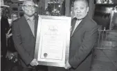  ?? ERIC CHARBONNEA­U ?? Director Reginald Hudlin, left, joins Thurgood Marshall’s son John W. Marshall at a screening Oct. 2 in Los Angeles.