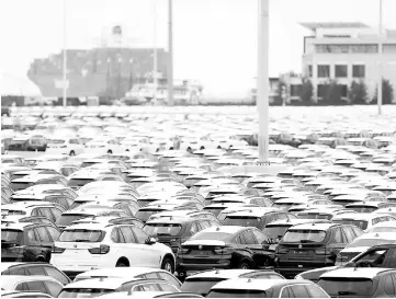  ??  ?? BMW vehicles assembled in the US wait to be driven onto vehicle carrier ships at the South Carolina Ports Authority in Charleston, South Carolina, on Oct 4, 2016.