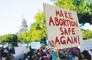  ?? (AP photo/eric Gay, File) ?? Demonstrat­ors march and gather June 24, 2022, near the Texas Capitol in Austin following the U.S. Supreme Court’s decision to overturn Roe v. Wade. A Texas man is petitionin­g a court to use an obscure legal action to find out who helped his former partner in an alleged out-of-state abortion, setting up the latest test to the limits of statewide abortion bans.