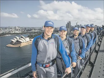  ?? PICTURE: DALLAS KILPONEN ?? BRIDGING THE GAP: Front to back, Joel Tomkins (Wigan), Sam Powell (Wigan), The Yorkshire Post’s Dave Craven, Brad Fash (Hull), Jack Downs (Hull) and Josh Griffin (Hull) take the opportunit­y to walk across the famous Sydney Harbour Bridge.