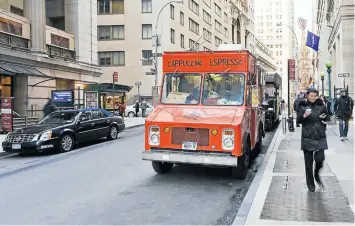  ?? ISTOCK ?? FASTER FOOD: A coffee truck on Wall Street in New York, US