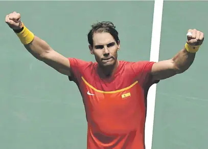  ?? Picture: AFP ?? MIGHTY FIGHT. Spain’s Rafael Nadal celebrates after beating Russia’s Karen Khachanov at the Davis Cup Madrid on Tuesday night.