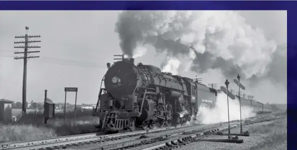  ?? Hal Lewis, Center for Railroad Photograph­y & Art collection ?? NYC’s Riley was one of the last stands of high-speed passenger steam operation in America. Hudson 5395 crests the hill out of the Wabash River valley at Summit, 1.8 miles west of Lafayette, in the early ’50s.