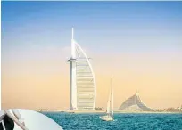  ??  ?? Gulf club: The Burj Al Arab hotel in the UAE, where some of the super-rich have jetted for the jab