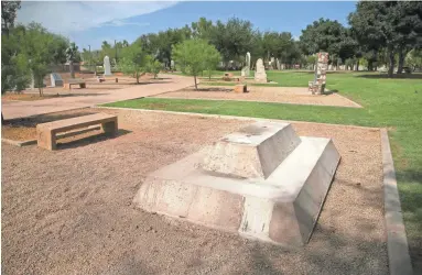  ??  ?? The base that held the memorial to Confederat­e troops remains at the Arizona Capitol Thursday.