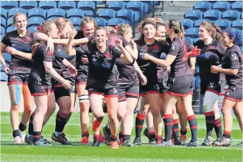  ?? ?? Team effort The delighted Biggar players celebrate their success after defeating Ayr at Murrayfiel­d