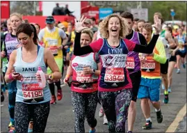  ??  ?? MILES BETTER: The London marathon is a popular choice for fundraiser­s