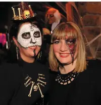  ??  ?? Aoife O’Reilly and Ann Rohan mixing the Mexican Day of the Dead and unzipped horror look at Killarney Grand.