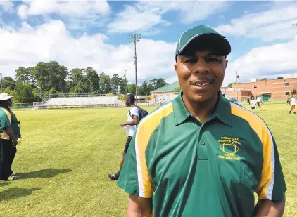  ?? DAVID MACAULAY/FREELANCE FILE ?? Elisha“Cadillac”Harris became the first Black high school football head coach in Virginia Beach when he was hired at Green Run in 1988. Now, more than half of the high school football head coaches in Virginia Beach are Black.