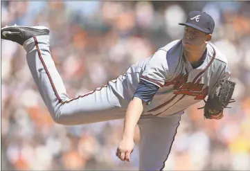  ?? Ben Margot / The Associated Press ?? Atlanta pitcher Aaron Blair delivers against the San Francisco Giants during the first inning of Sunday’s game.