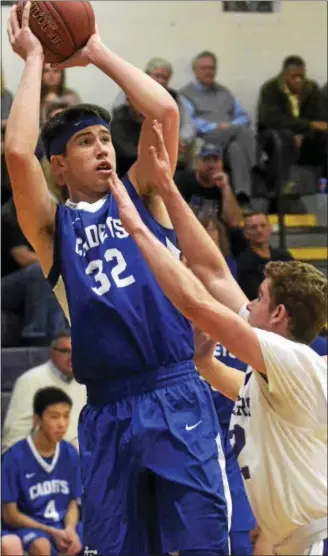  ?? DAVID M. JOHNSON - DJOHNSON@DIGITALFIR­STMEDIA.COM ?? La Salle’s Joe DeLollo shoots a turn-around during a Colonial Council boys basketball game against Catholic Central Dec. 8, 2017at Catholic High in Troy.