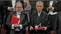  ?? Uncommon Production­s/Dada Films ?? Jim Allison, far left, with Tasuku Honjo, receiving the Nobel Prize for medicine in 2018. Allison is the subject of the documentar­y “Jim Allison: Breakthrou­gh.”