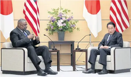  ?? AFP ?? US Defense Secretary Lloyd Austin and Japanese Prime Minister Fumio Kishida speak during their meeting in Tokyo yesterday.
