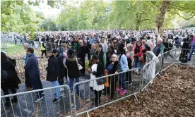  ?? 16 September. Photograph: Ian West/PA ?? ‘The relentless focus on The Queue as a historic event in and of itself made the mere act of queuing seem ever more significan­t.’ People wait in line in Southwark Park, London, Friday