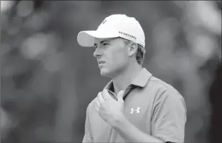  ?? Associated Press ?? Jordan Spieth watches his approach shot on the fifth hole July 29 during the second round of the PGA Championsh­ip golf tournament at Baltusrol Golf Club in Springfiel­d, N.J. Spieth missed being part of the Olympics even before the golf began. Rory...