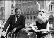  ?? OLIVIER BOITET — THE ASSOCIATED PRESS FILE ?? French author and illustrato­r Albert Uderzo poses with character Asterix in Sept. of 1985in Paris. Albert Underzo, one of the two creators of the beloved comic book character Asterix, who captured the spirit of the Gauls of yore and grew a reputation worldwide, died early March 24. He was 92.
