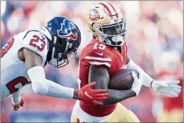  ?? SHAE HAMMOND — BAY AREA NEWS GROUP ?? San Francisco 49ers’ Deebo Samuel (19) runs the ball for a touchdown against Houston
Texans’ Arian Foster (23) in the fourth quarter at Levi’s Stadium in Santa Clara on Jan. 2, 2022.