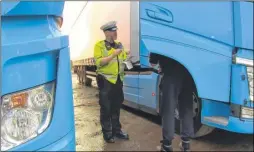  ??  ?? Police crack down on illegally parked lorry drivers