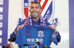  ?? AFP ?? Argentine striker Carlos Tevez signed with Shanghai Shenhua in 2017.