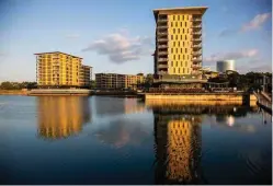  ??  ?? Elegant high-rise apartments, smart restaurant­s and popular bars line the water’s edge along Recreation Lagoon in Darwin’s original harboursid­e district.