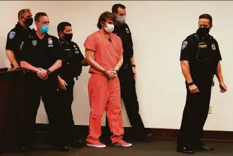  ?? Matt Rourke / Associated Press ?? Payton Gendron is led into the courtroom for a hearing in Buffalo, N.Y. Gendron faces charges in the fatal shootings of 10 Black people at a supermarke­t. He is being held in jail without bail.