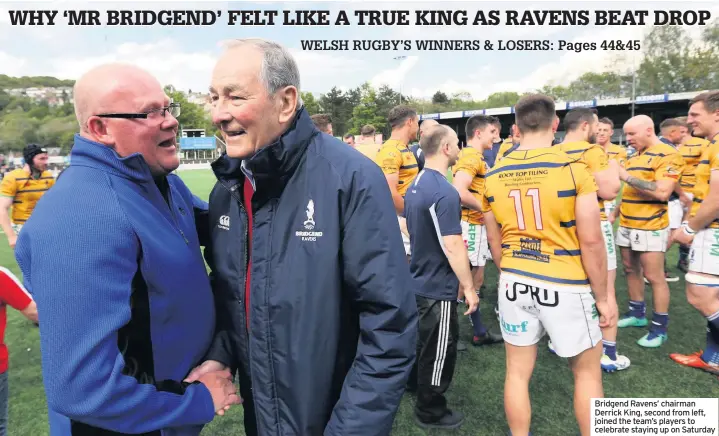  ??  ?? Bridgend Ravens’ chairman Derrick King, second from left, joined the team’s players to celebrate staying up on Saturday