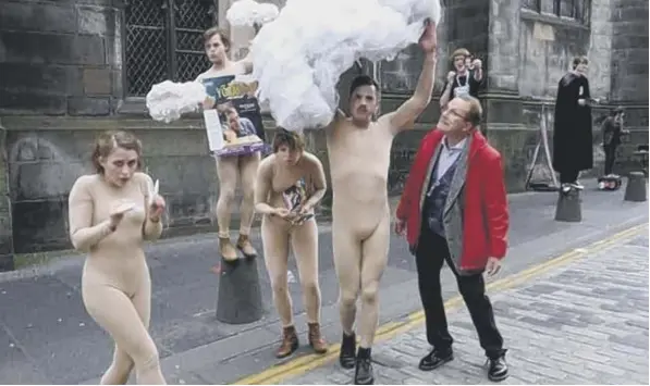  ??  ?? 0 Edinburgh Festival Fringe performers promote their show on the Royal Mile in happier times as Joe Goldblatt looks for a silver lining in their cloud