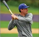  ?? PETE BANNAN — MNG FILE ?? West Chester University baseball coach Jad Prachniak hits grounders to his team during practice at Serpico Stadium.