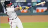  ?? CURTIS COMPTON/TNS ?? Atlanta’s Ronald Acuna Jr. became the youngest player to hit a leadoff homer in a playoff game.