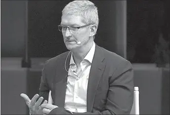  ?? SAN FRANCISCO
-AP ?? Apple CEO Tim Cook speaks during a discussion session at a conference.