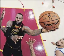  ?? ASSOCIATED PRESS FILE PHOTO ?? LeBron James left the Cavs’ $35.6-million option on the table Friday, before becoming a free agent and signing for $154 million on Sunday.