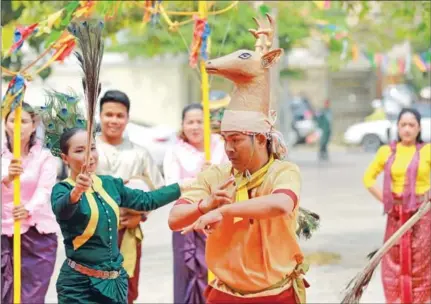  ?? ?? The Trot Dance, or Robam Trot, is performed at the Ministry of Civil Service headquarte­rs in April last year. The traditiona­l dance is usually performed during Khmer New Year, or Songkran, and is believed to bring happiness for the New Year.