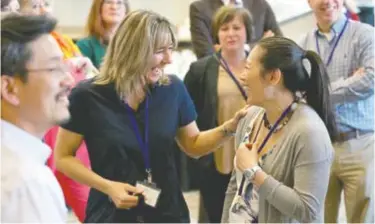  ??  ?? Boehringer Ingelheim (Canada) employees Caroline Sevigny and Anh Tran share a moment at the company’s Value Through Innovation Day. Each year, all Boehringer Ingelheim employees around the world celebrate Value Through Innovation Day to reflect on the...