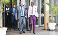 ?? ?? Former Mighty Warriors coach Shadreck Mlauzi (right) arrives at the Harare Magistrate Courts where his sentencing was postponed to 10 January 2024