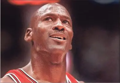  ?? AP-Mark J. Terrill, File ?? “The Last Dance,” ESPN’s docuseries detailing the 1998 and final season of the Chicago Bulls championsh­ip dynasty, has served as a reminder to basketball fans of the greatness of Michael Jordan on the court. It also shed light on his worldwide marketing allure.