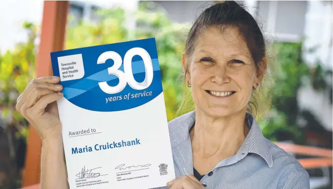  ??  ?? Ingham’s Maria Cruickshan­k celebrates more than 30 years of service as a registered nurse for Townsville Hospital and Health Service. Picture: Supplied