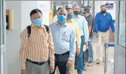  ?? BLOOMBERG ?? People wait in line to register during the administer­ing of the Covaxin vaccine in New Delhi.