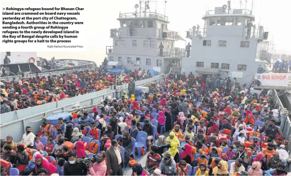  ?? Rajib Raihan/Associated Press ?? Rohingya refugees bound for Bhasan Char island are crammed on board navy vessels yesterday at the port city of Chattogram, Bangladesh. Authoritie­s in the country were sending a fourth group of Rohingya refugees to the newly developed island in the Bay of Bengal despite calls by human rights groups for a halt to the process