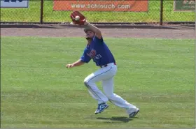  ?? AUSTIN HERTZOG - MEDIANEWS GROUP ?? Boyertown left fielder Pat Wieand makes a catch near the foul line against Souderton during the Pa. Region 2 tournament at Boyertown on July 21.