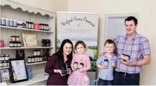 ??  ?? Laura and Tom Sinnott, owners of Wexford Home Preserves, with their children Lila and Robbie